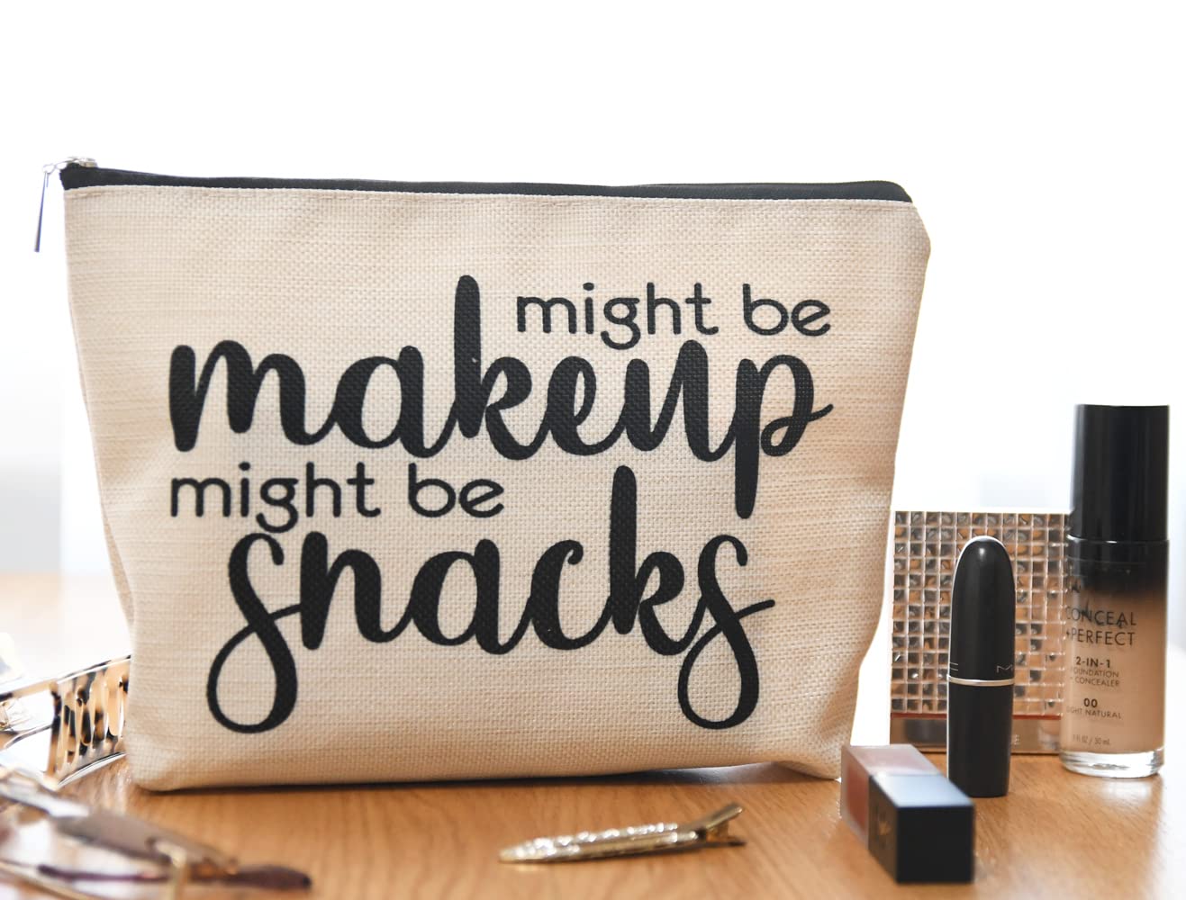JOY UINAN Christmas gift makeup bag, compact and durable for holidays.