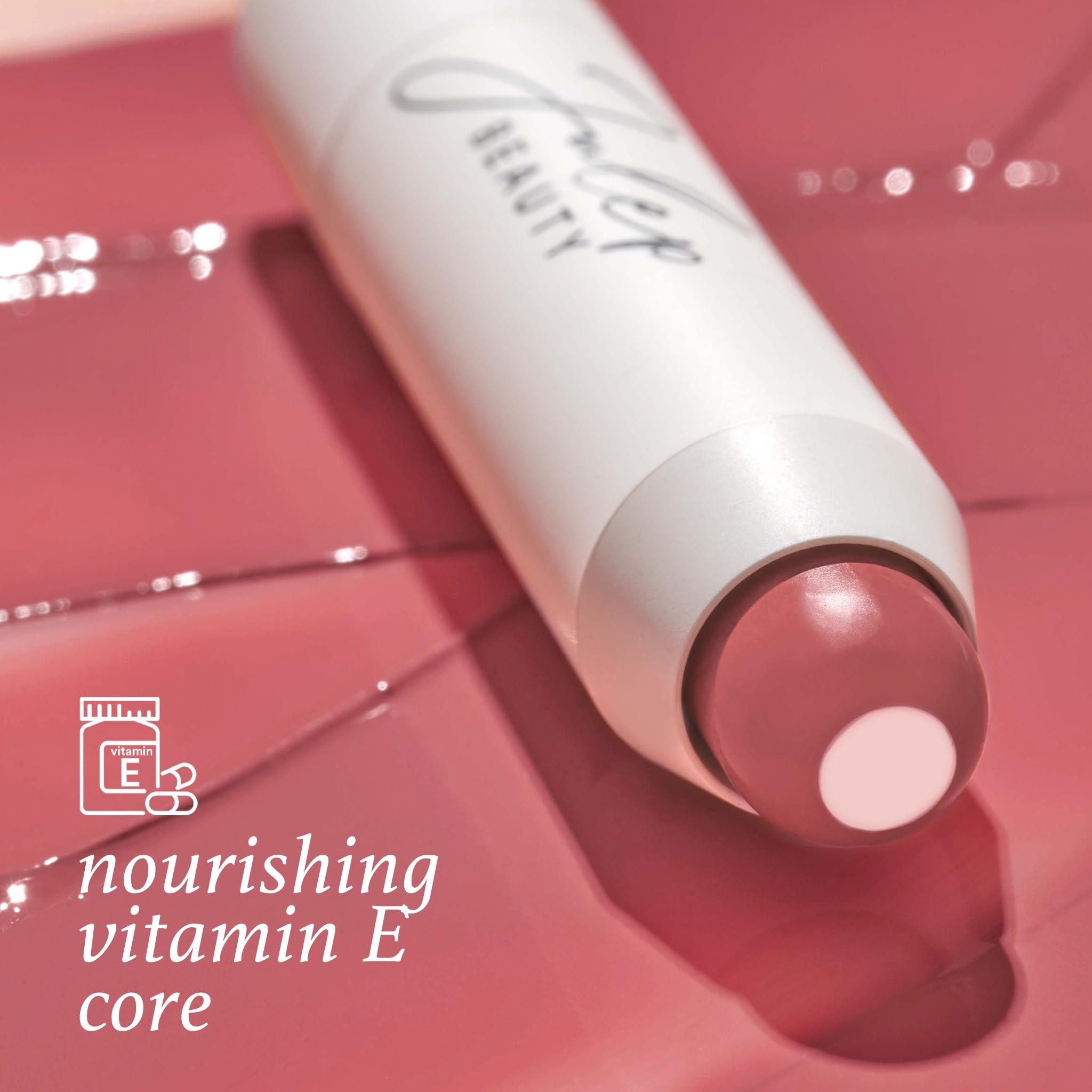 Julep It's Balm Tint Canyon Rose swatches on arm show sheer color.