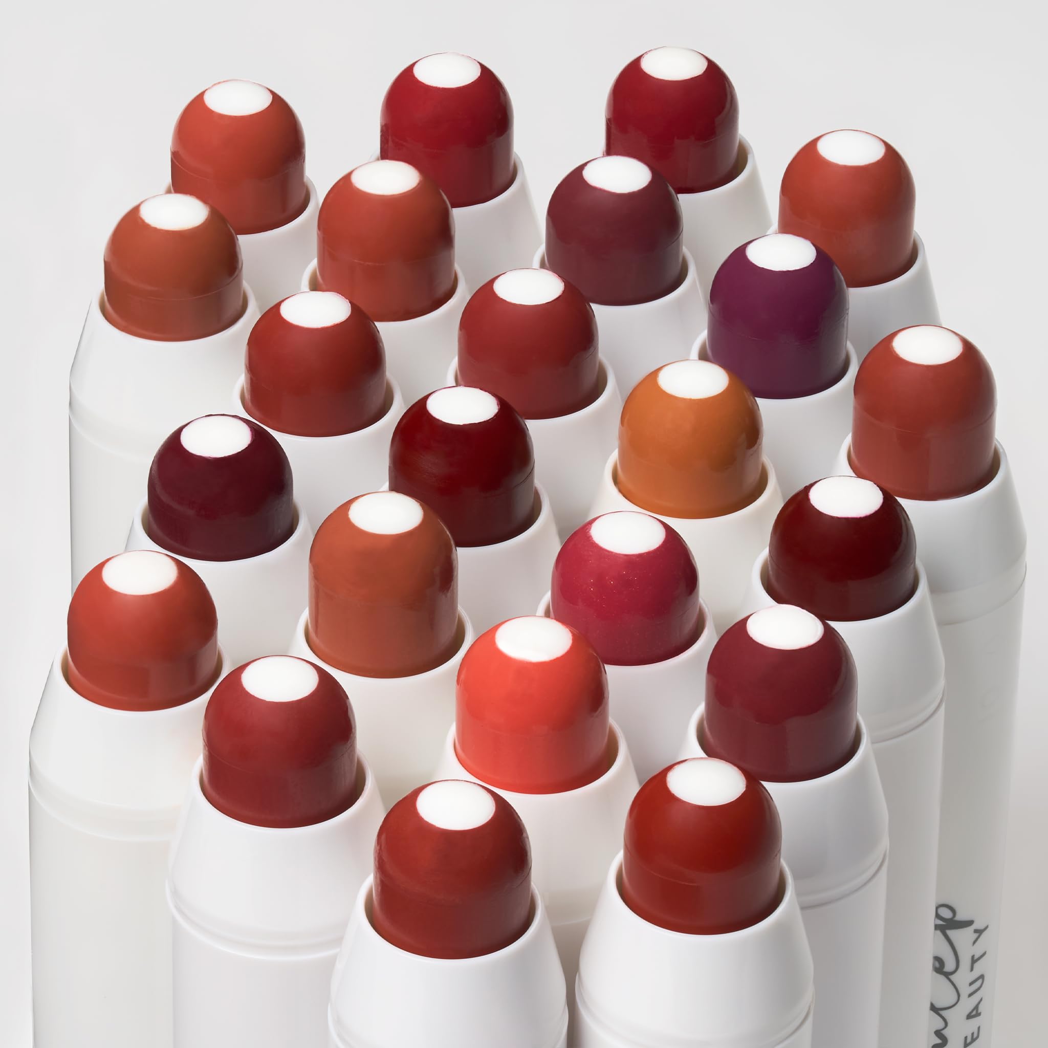 Julep It's Balm Tint Cinnamon Raisin worn on lips for everyday neutral to berry looks.