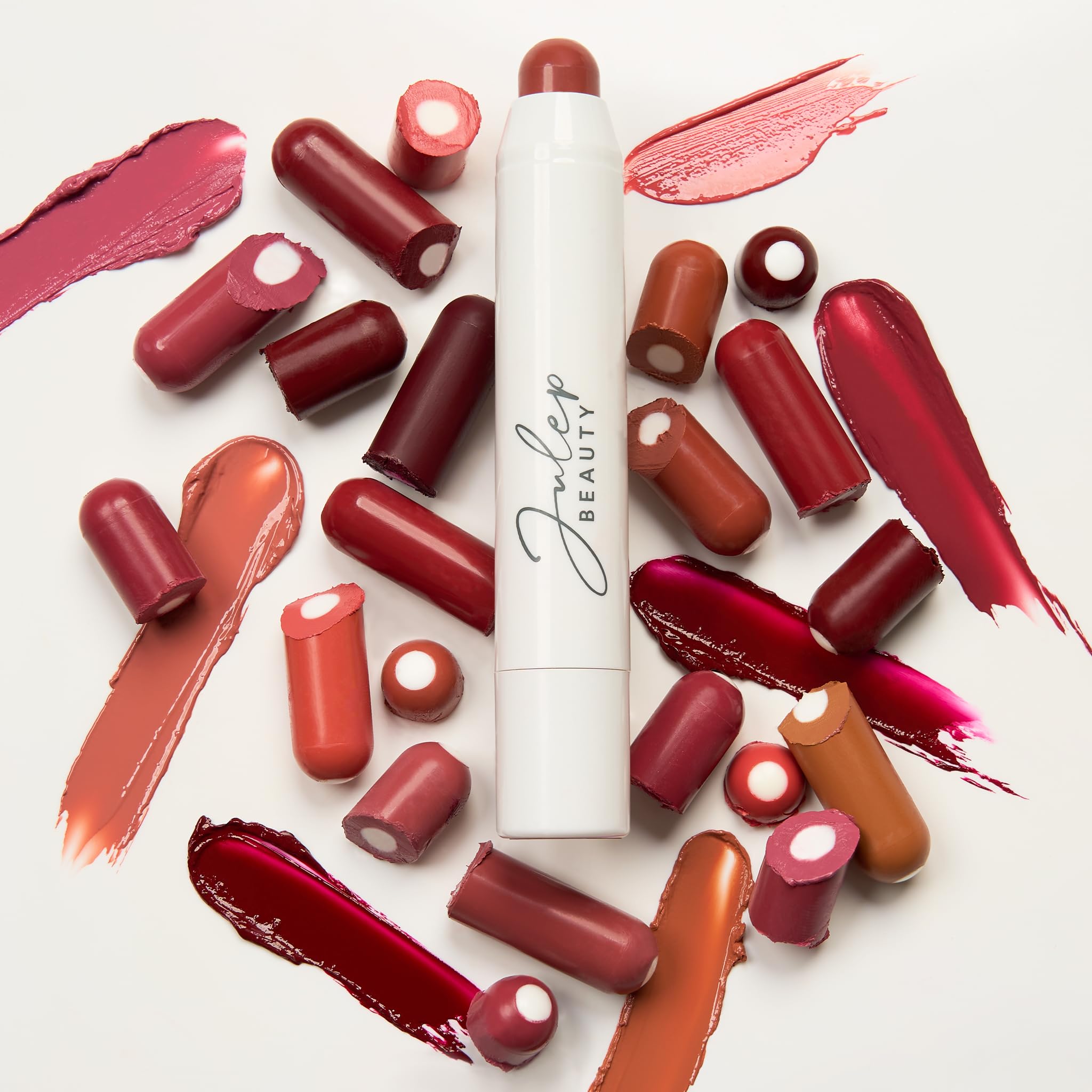 Julep It's Balm Tint Nectar Pink Creme shade swatches on multiple skin tones