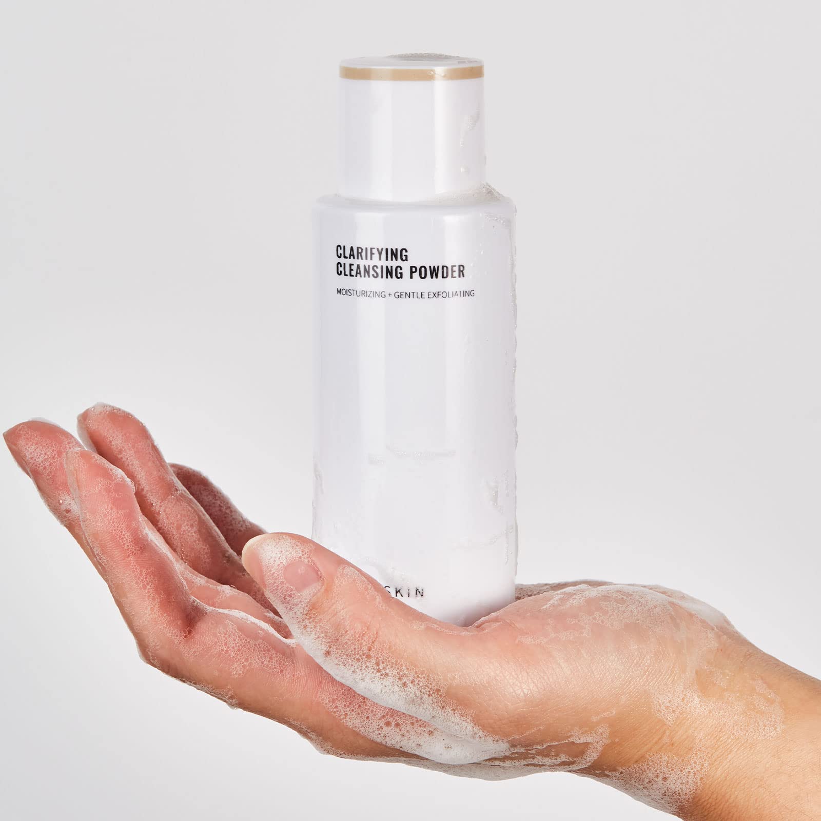 JUNO & Co Exfoliating Face Wash foam texture close-up shows refreshing cleanse and soft skin.