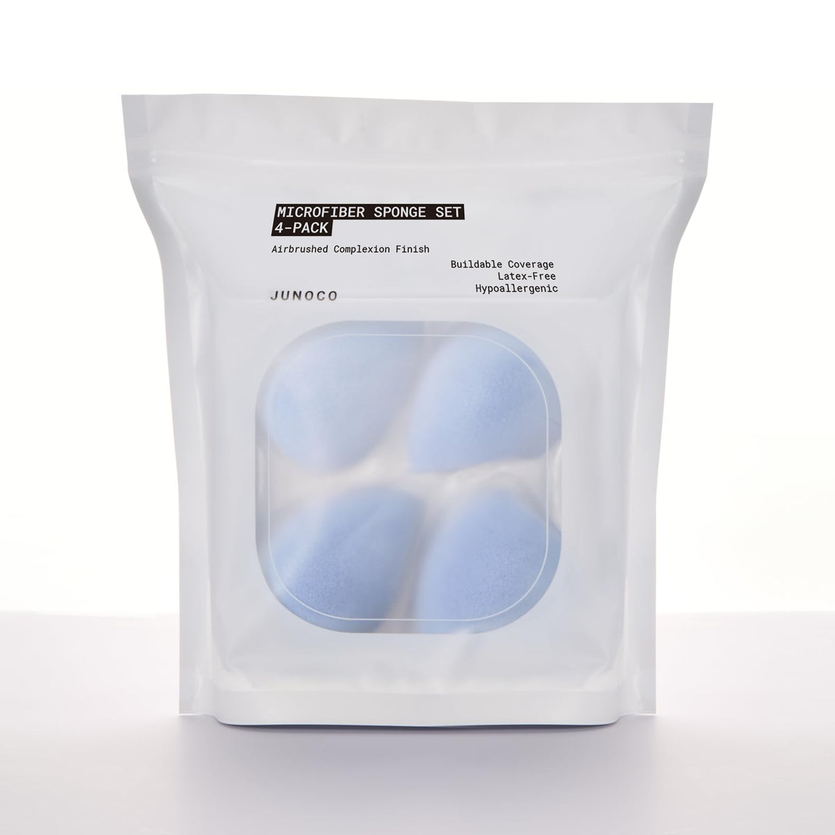 JUNO & Co. Microfiber sponge set laid flat for four-pack viewing, suggesting easy routine integration.