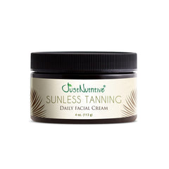 Just Nutritive Sunless Tanning Daily Facial Cream tube closeup showing creamy bronze tint