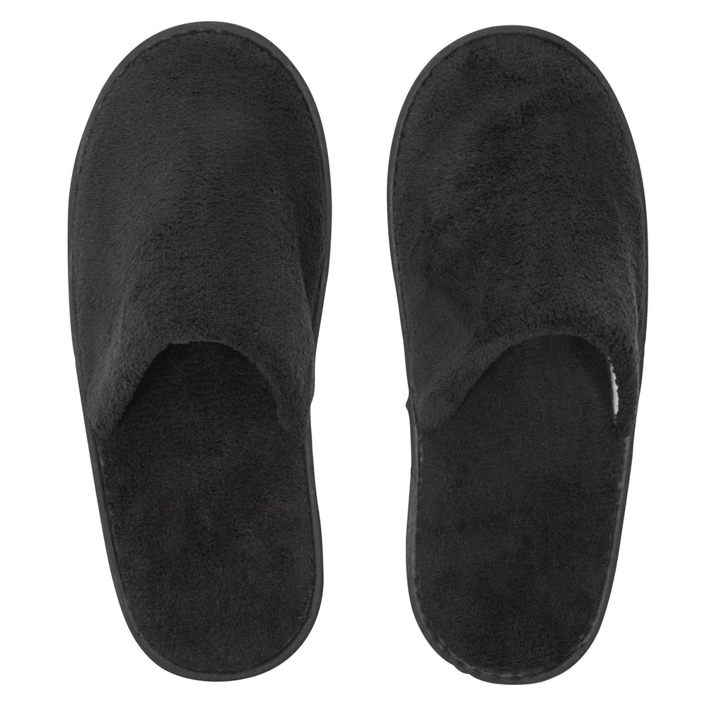 Juvale disposable slippers in bathroom setting suggest indoor, damp-space use.