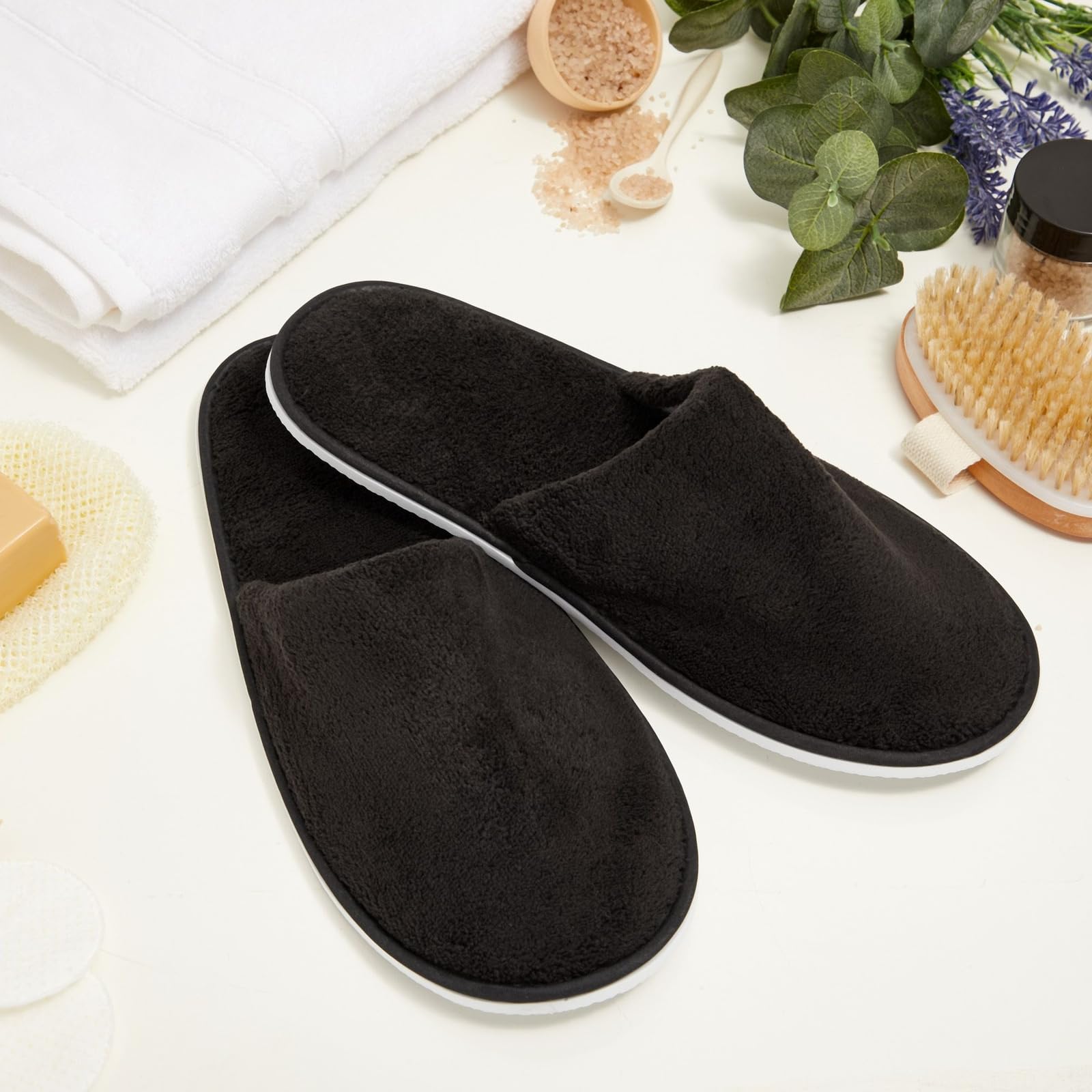 Juvale disposable slippers slip-resistant sole highlights safe footing on wet floors.
