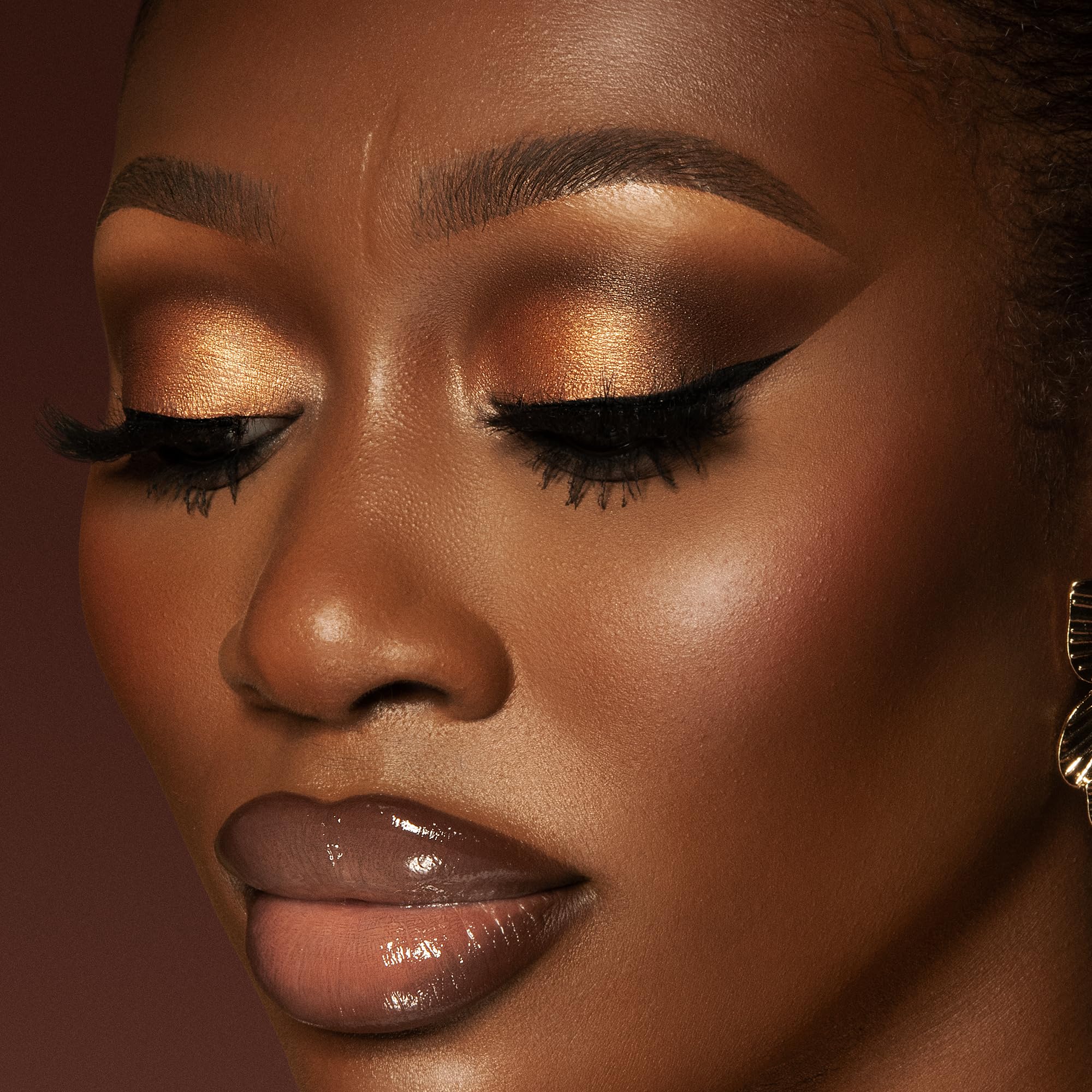 Juvia's Place Coffee Shop dark chocolate shade adds smoky intensity for evening looks.