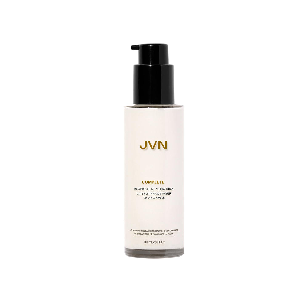 JVN Complete Blowout Styling Milk bottle shows silicone-free frizz control for salon results.