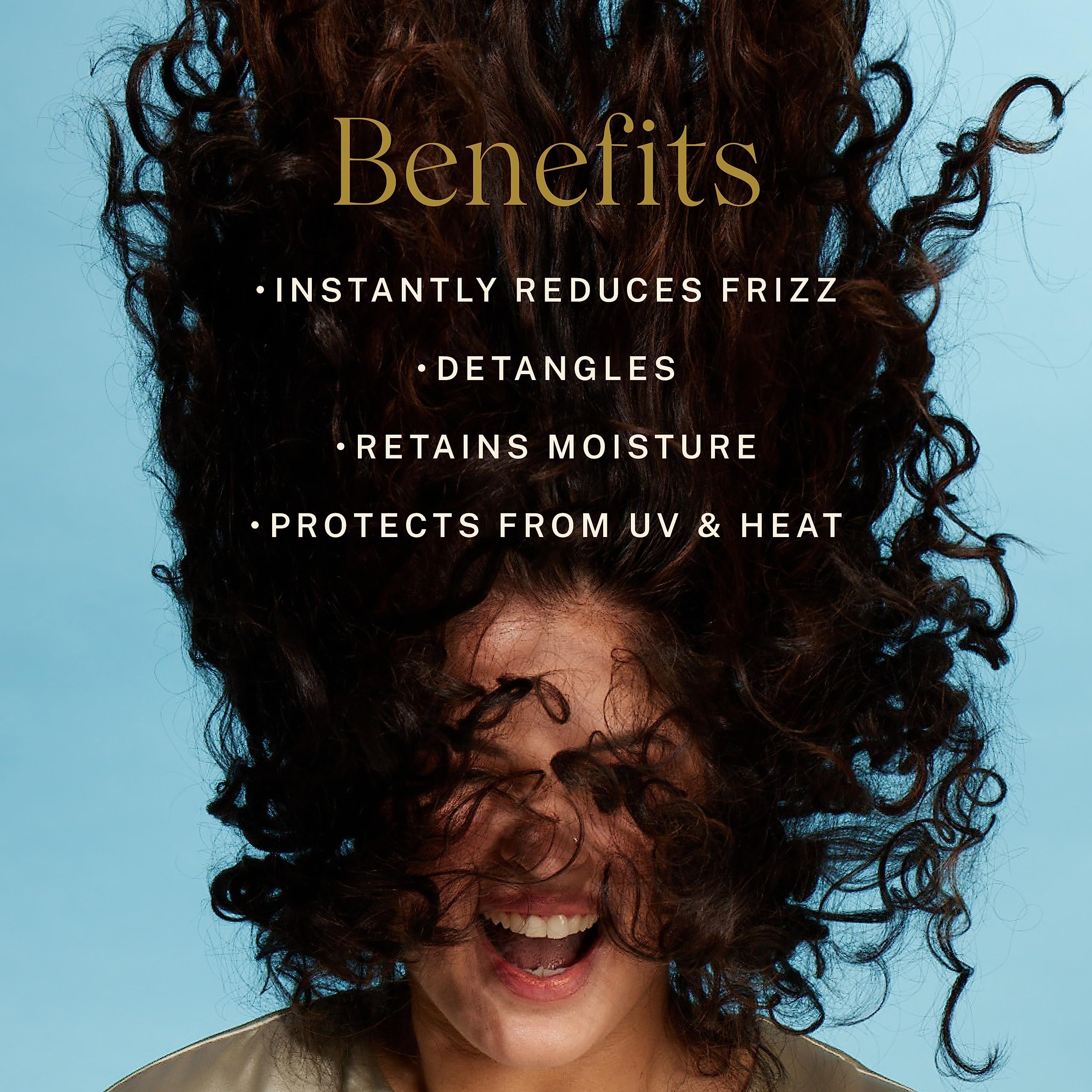 JVN Complete Leave-In conditioning mist spray application shown for detangling.