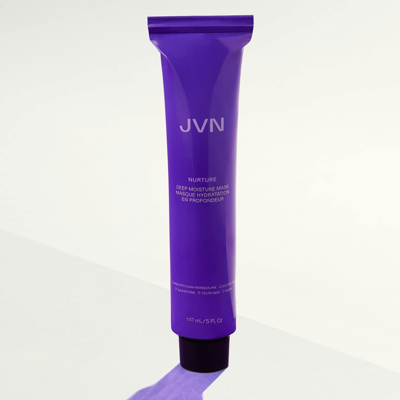JVN Nurture Deep Moisture Mask frizz-control action shot suggests lasting manageability.