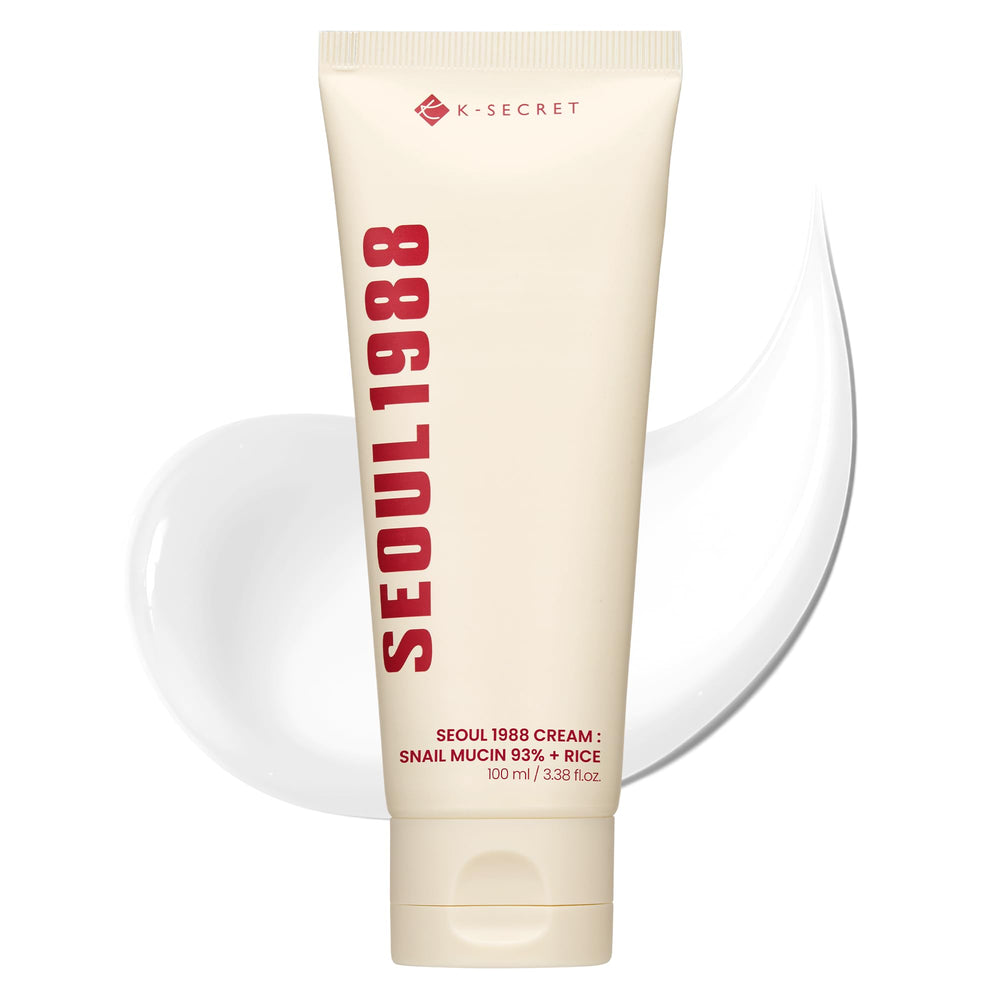 K-SECRET Seoul 1988 snail mucin cream bottle close-up for non-greasy hydration.