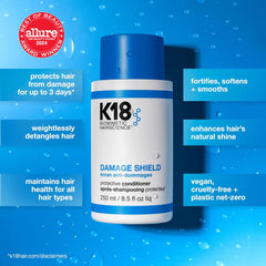 K18 Damage Shield conditioner bottle closeup highlights UV and environmental protection for hair.