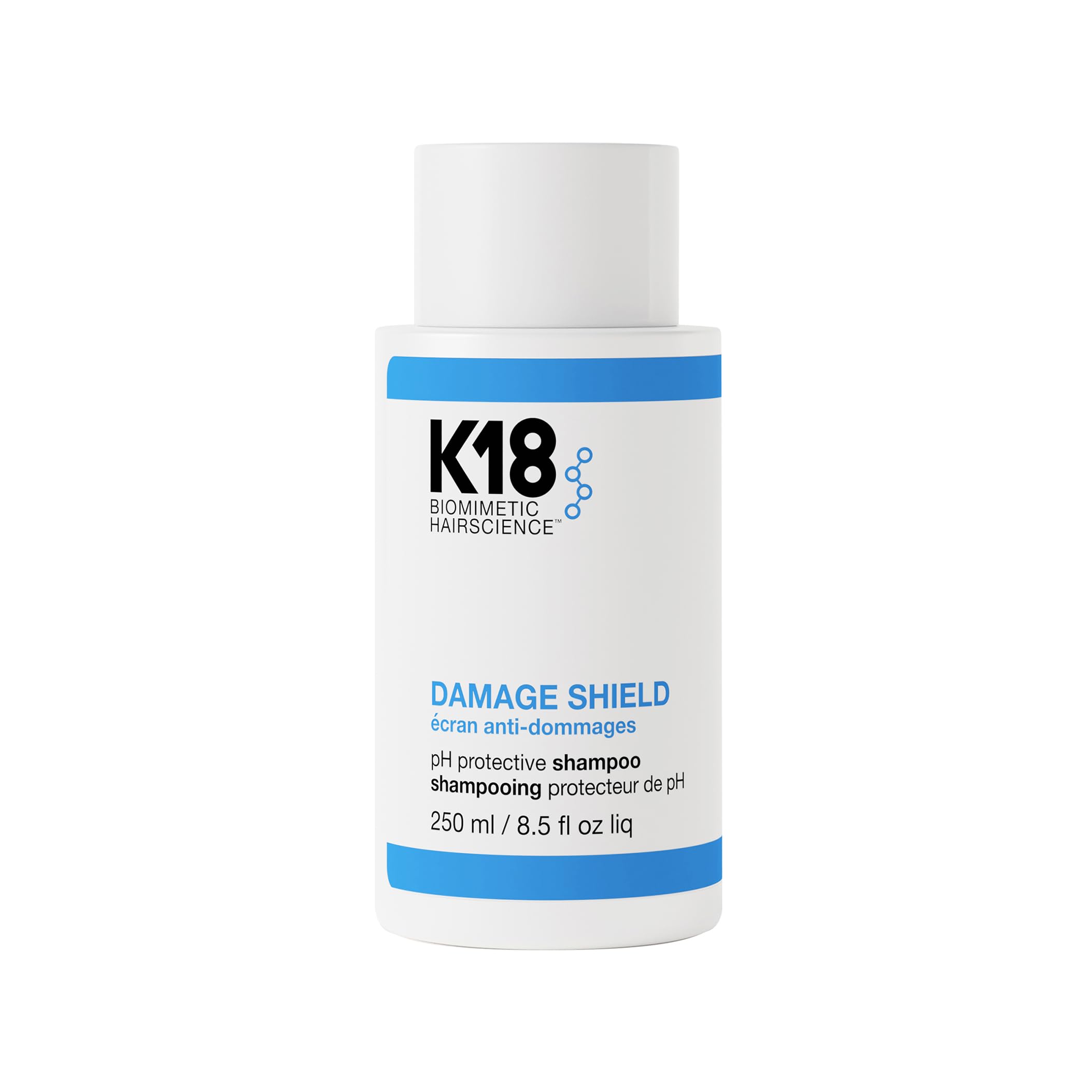 K18 Damage Shield Shampoo bottle demonstrating color-safe cleansing for vibrant, healthy hair.