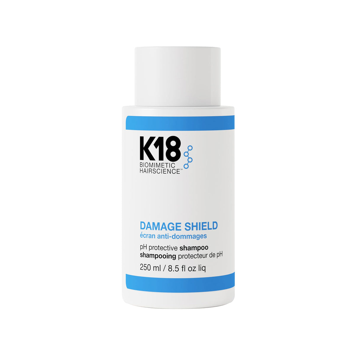K18 Damage Shield Shampoo bottle demonstrating color-safe cleansing for vibrant, healthy hair.
