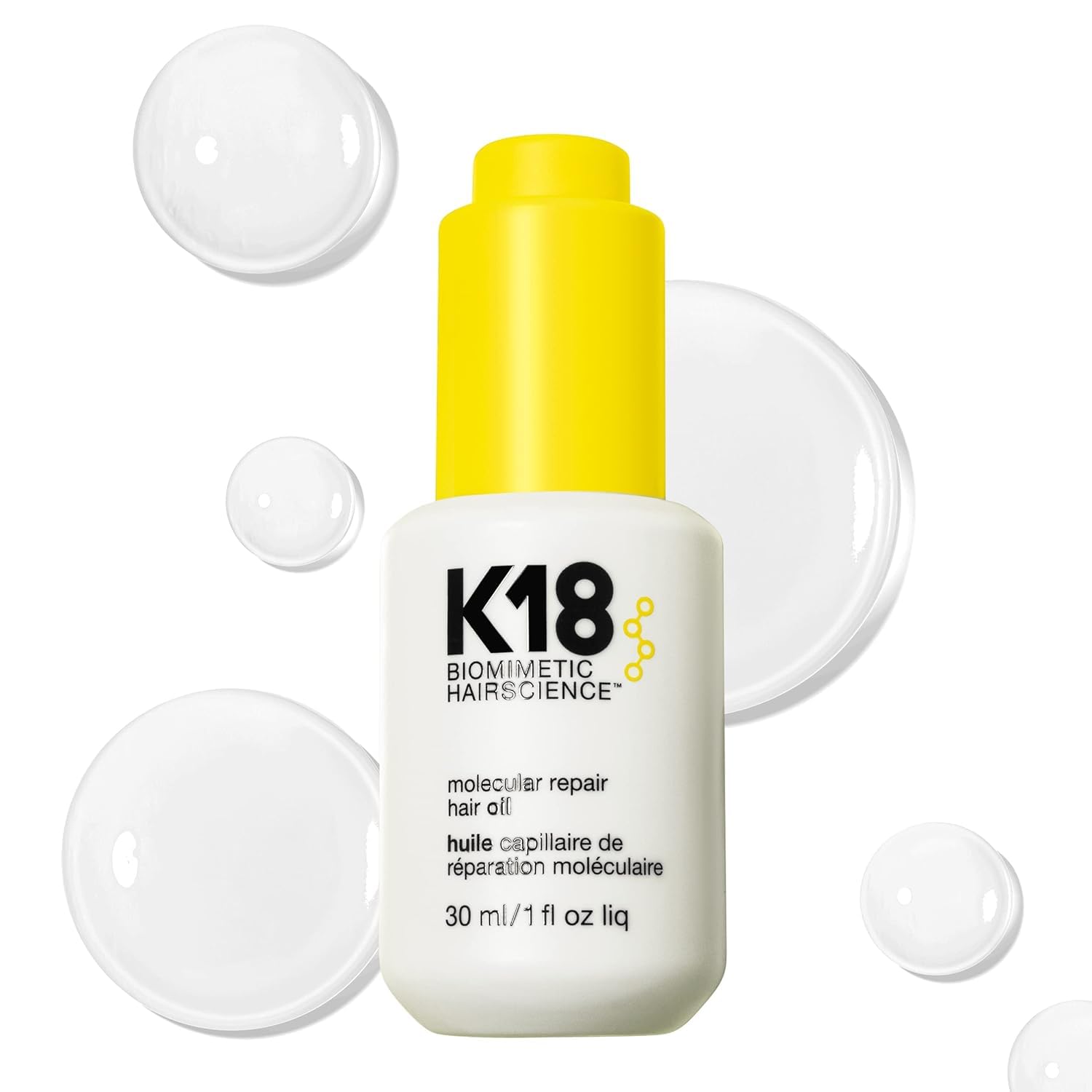 K18 Molecular Repair Hair Oil bottle close-up highlighting silicone-free, weightless conditioning