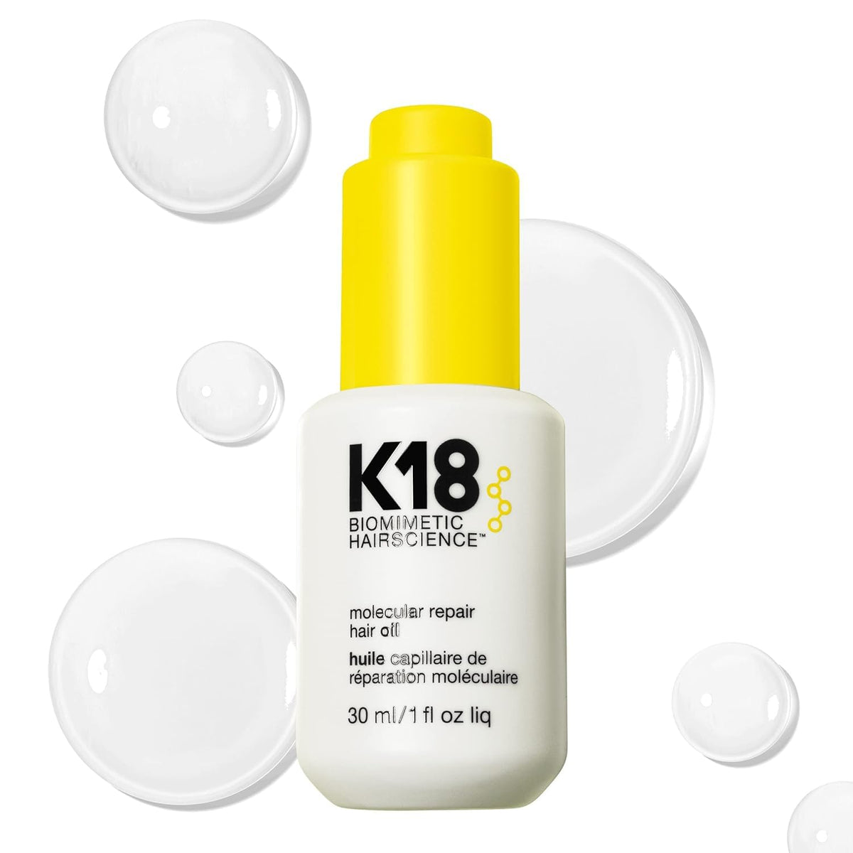 K18 Molecular Repair Hair Oil bottle close-up highlighting silicone-free, weightless conditioning