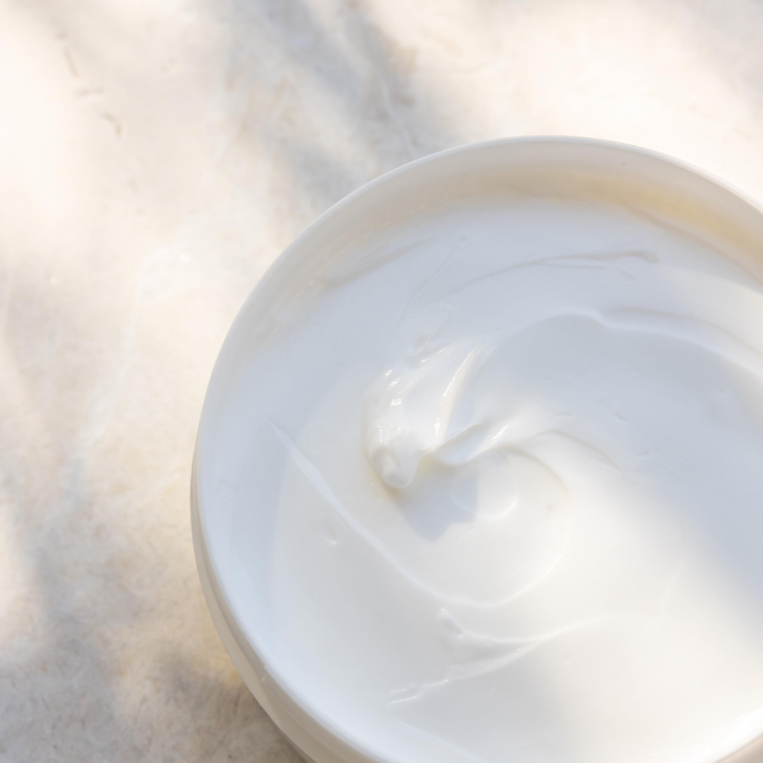 Kai Body Butter gardenia-scent close-up evokes tropical aroma for a soothing ritual.