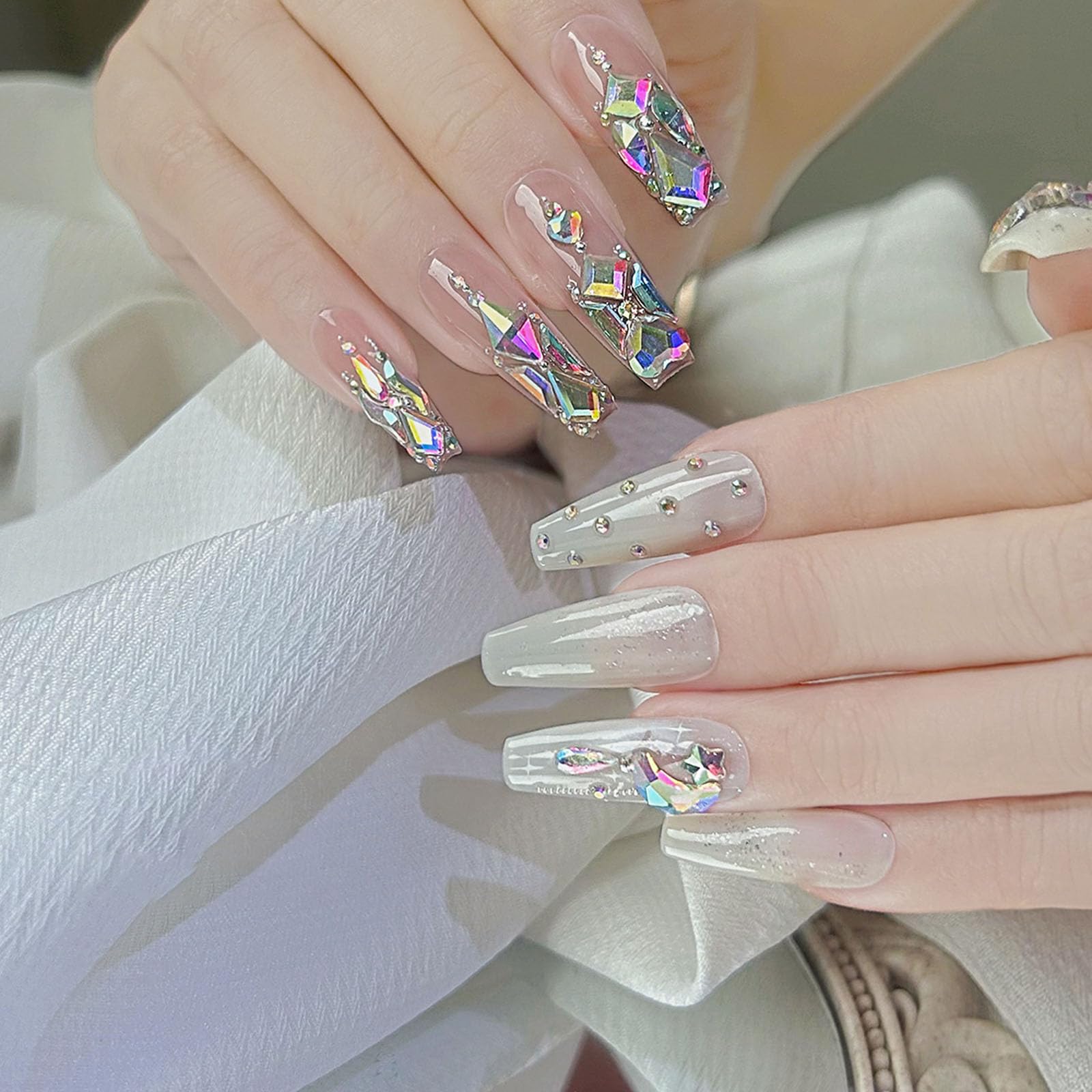 Kaipheiquan flat-back rhinestones showcase versatile shapes perfect for specialty nail designs.