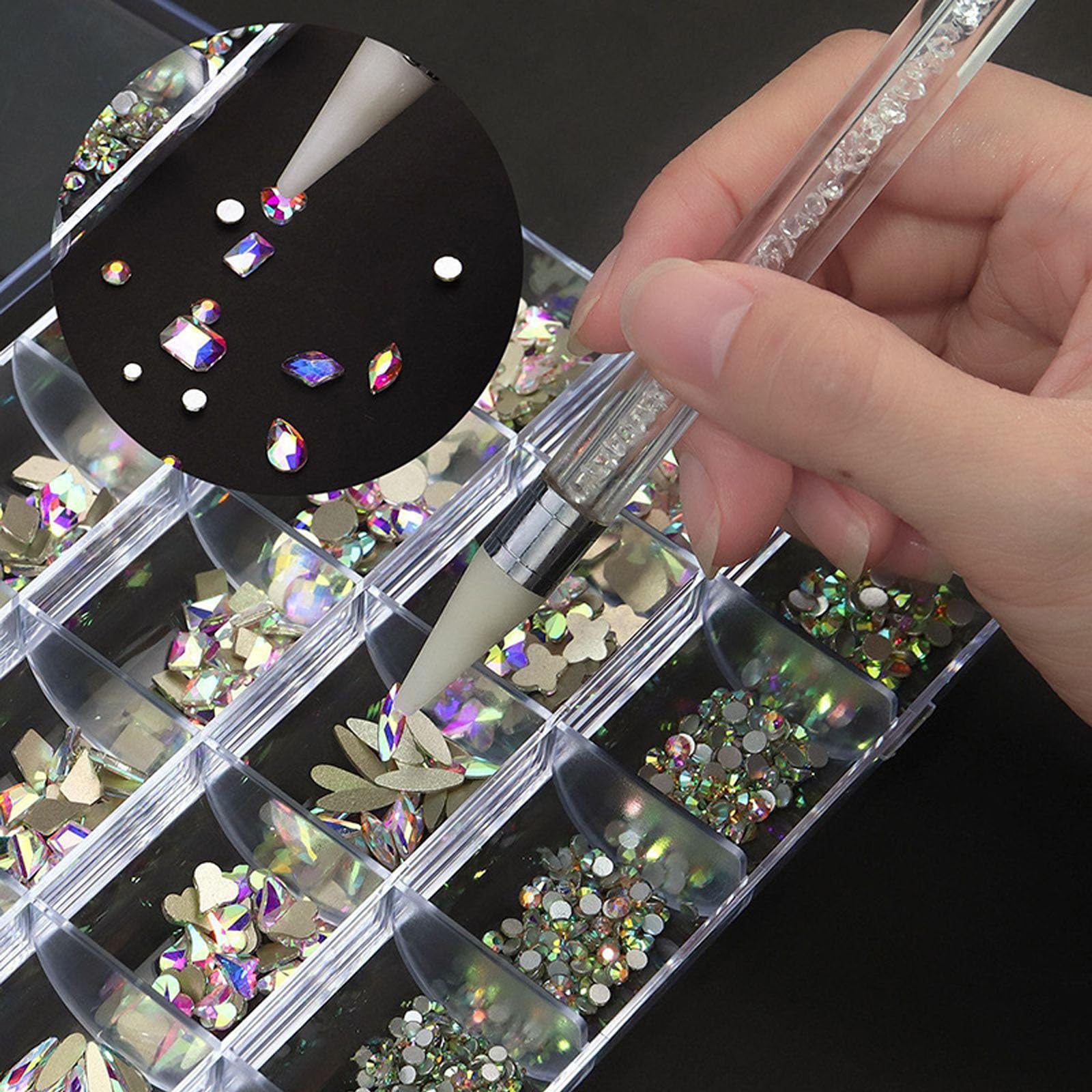 Kaipheiquan nail rhinestones kit contents laid out by size for precise DIY nail art.