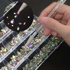 Kaipheiquan nail rhinestones kit contents laid out by size for precise DIY nail art.