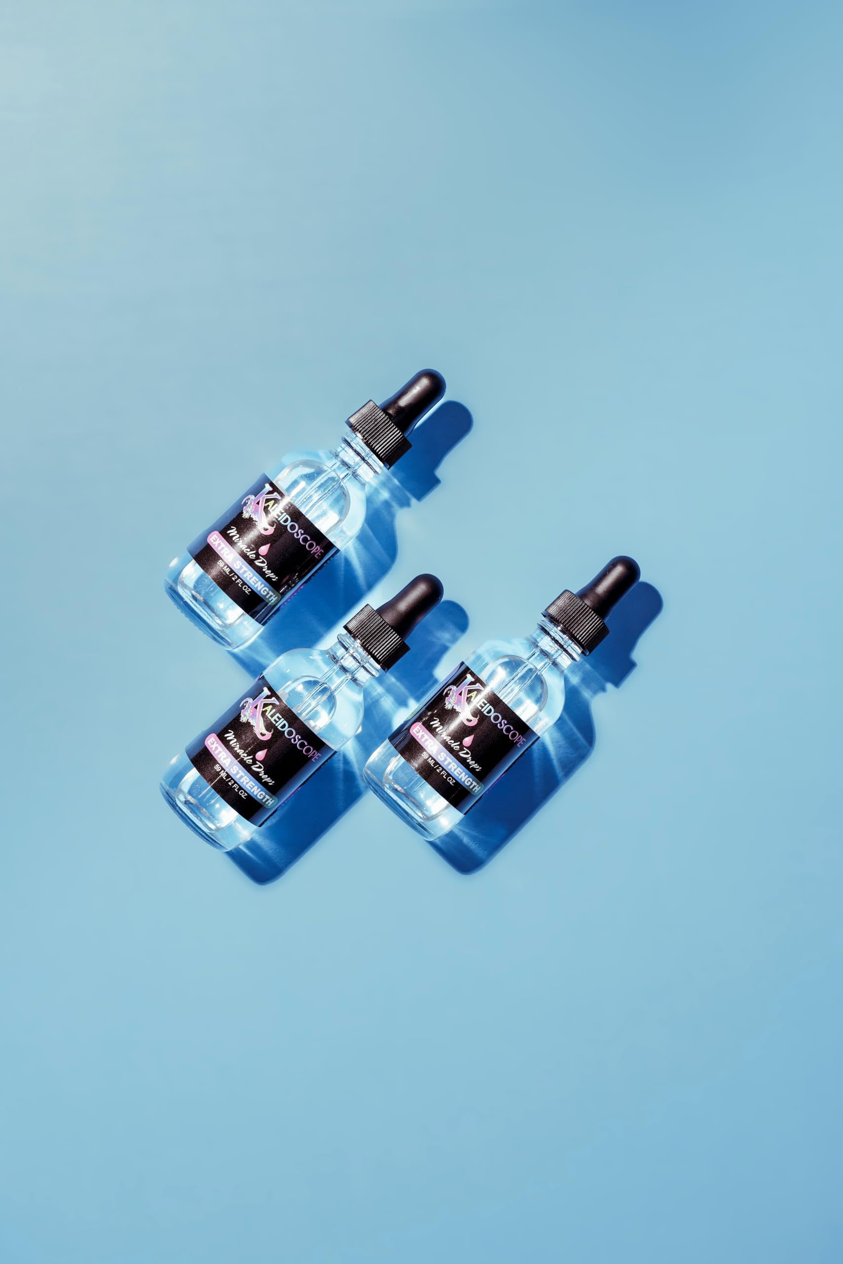 Kaleidoscope Miracle Drops Extra Strength scalp refresh shows peppermint cooling for circulation.