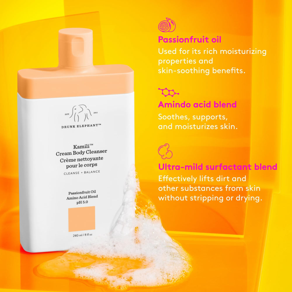 Kamili Cream Body Cleanser splash application highlights plant oils that replenish and soothe skin.