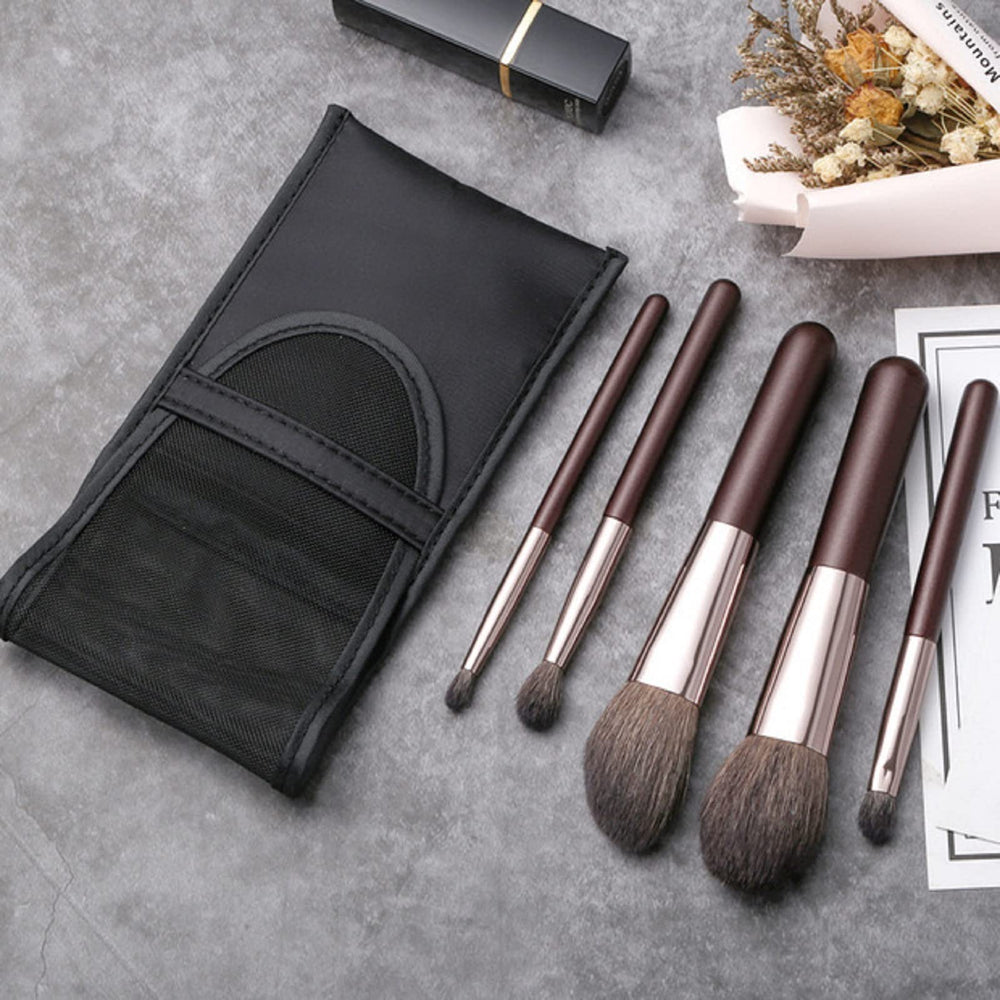 Kanviensl champagne-coffee travel case complements makeup bag aesthetics.