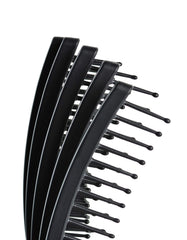 KareCo Mini Tangle Buster Brush detangles wet hair smoothly