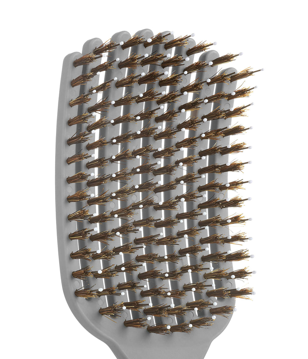 KareCo Tangle Buster glide-bristles closeup for snag-free detangling.