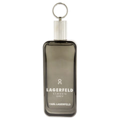 Karl Lagerfeld Paris Classic Grey bottle close-up highlights cedarwood and jasmine notes for lasting impression.