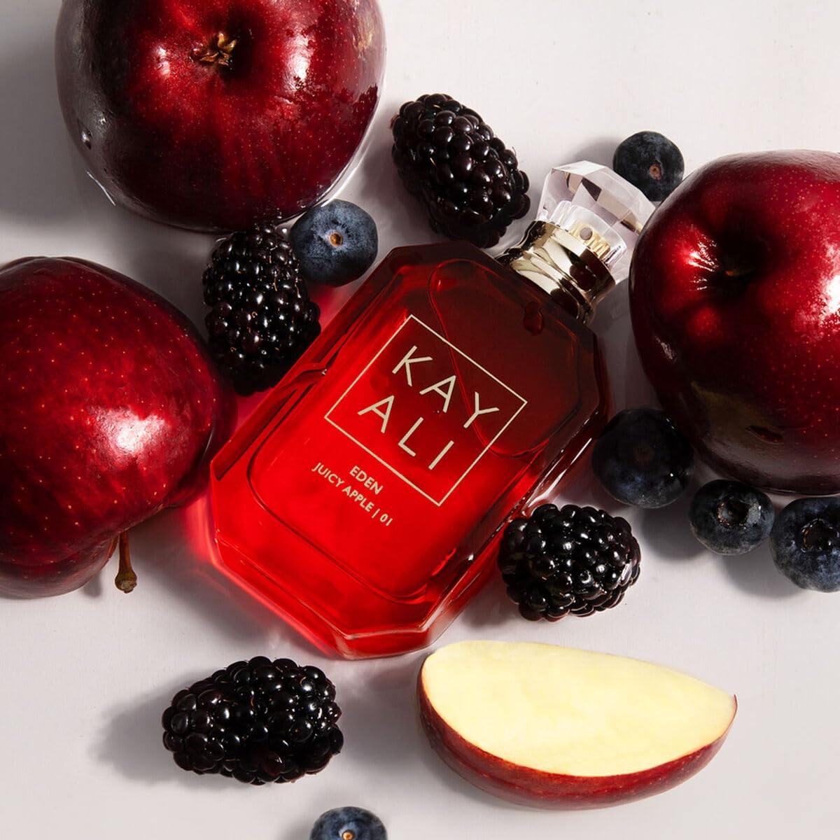 Kayali Eden Juicy Apple bottle label detail emphasizes luxe branding.