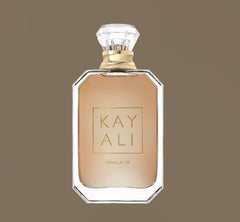 Kayali Vanilla 28 spray action demonstrates easy, even application.