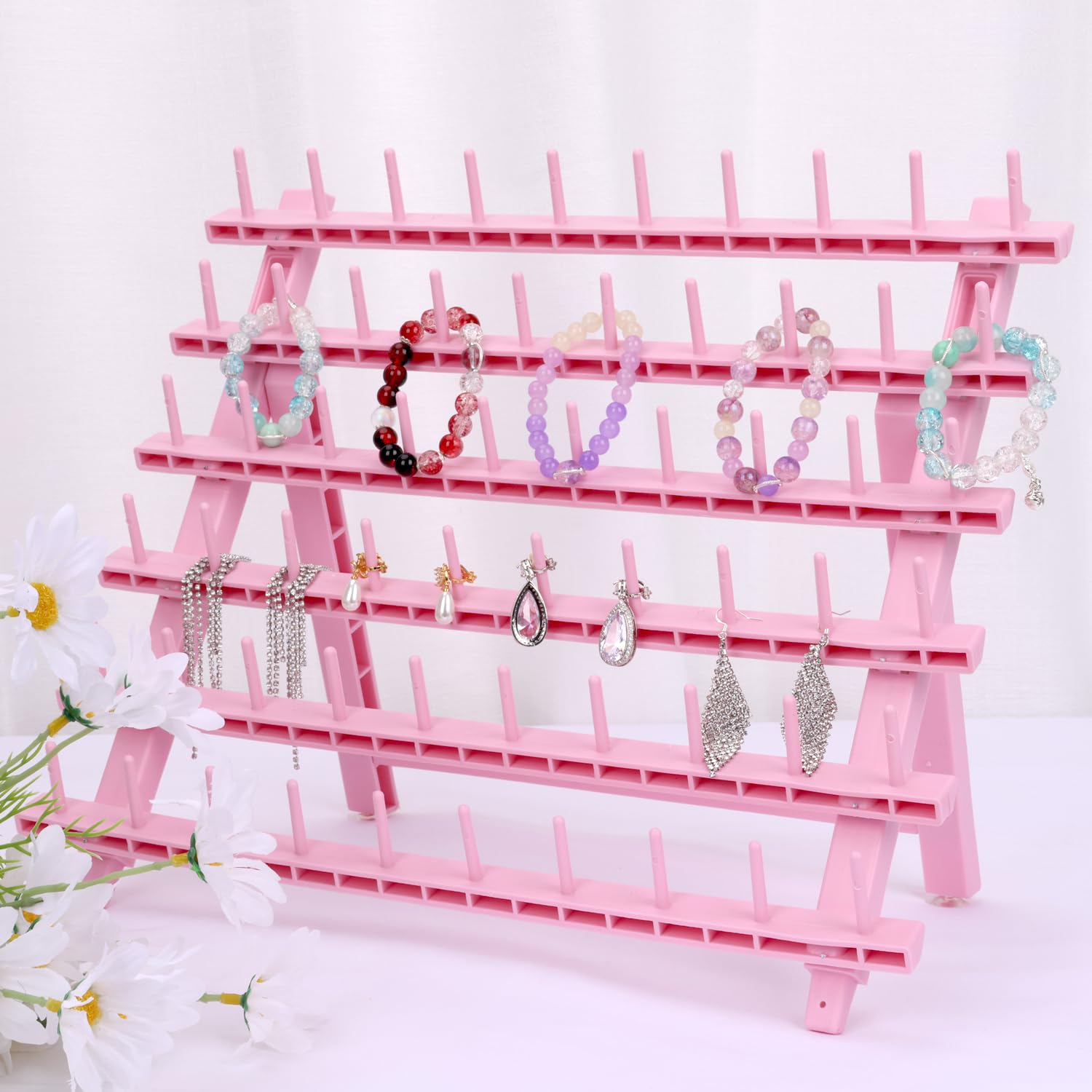 Kelukeya braid rack doubles as a display and organizer for accessories.