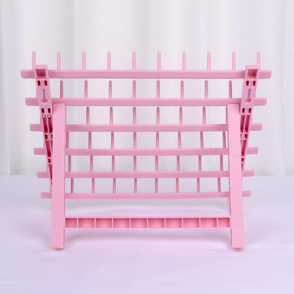 Kelukeya braid rack features light pink color for stylish salon ambience.
