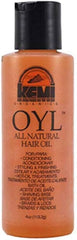 Kemi OYL All Natural Hair Oil bottle pour for quick scalp nourishment and styling prep.