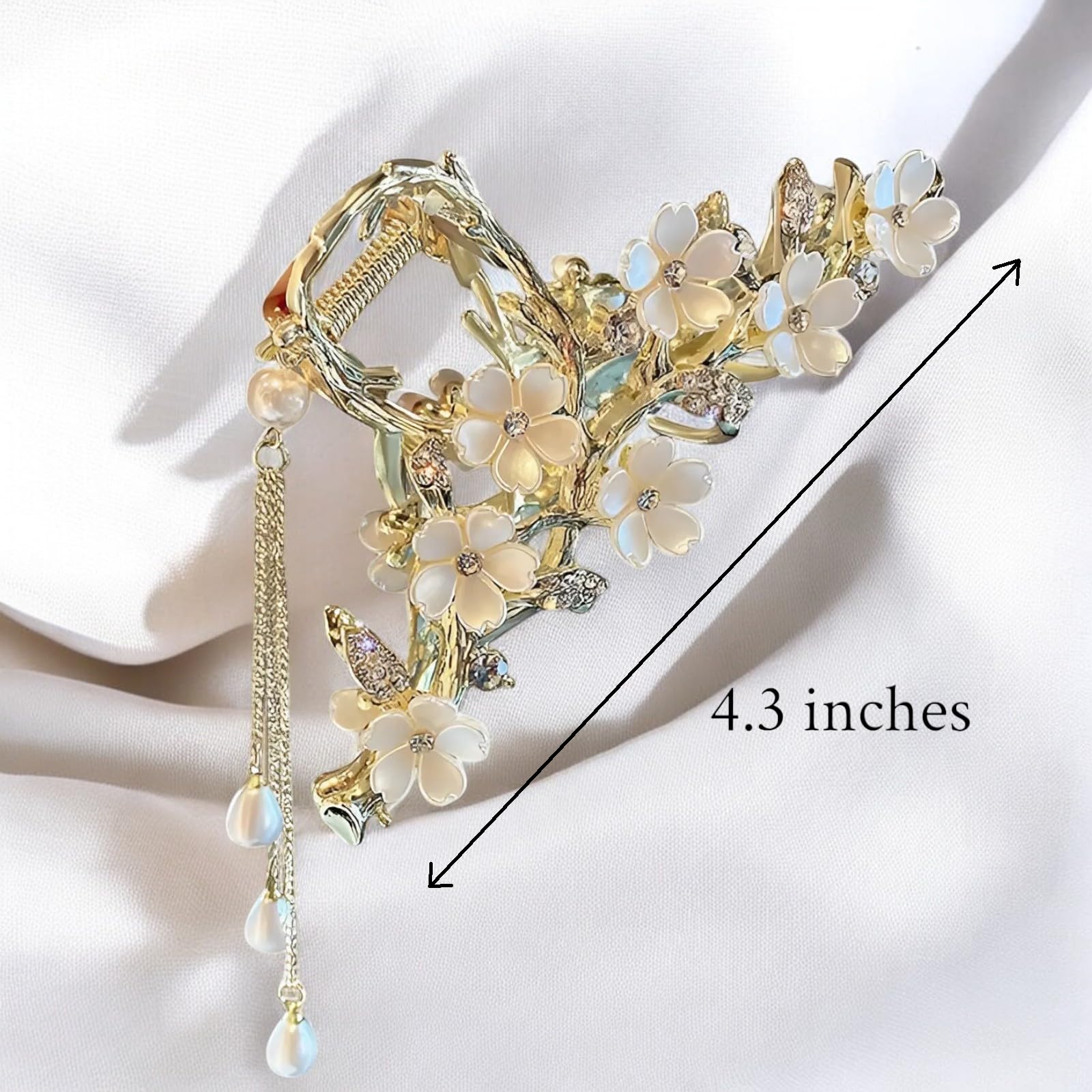 KEMMINTVN gold-toned design complements warm tones and formal occasions.