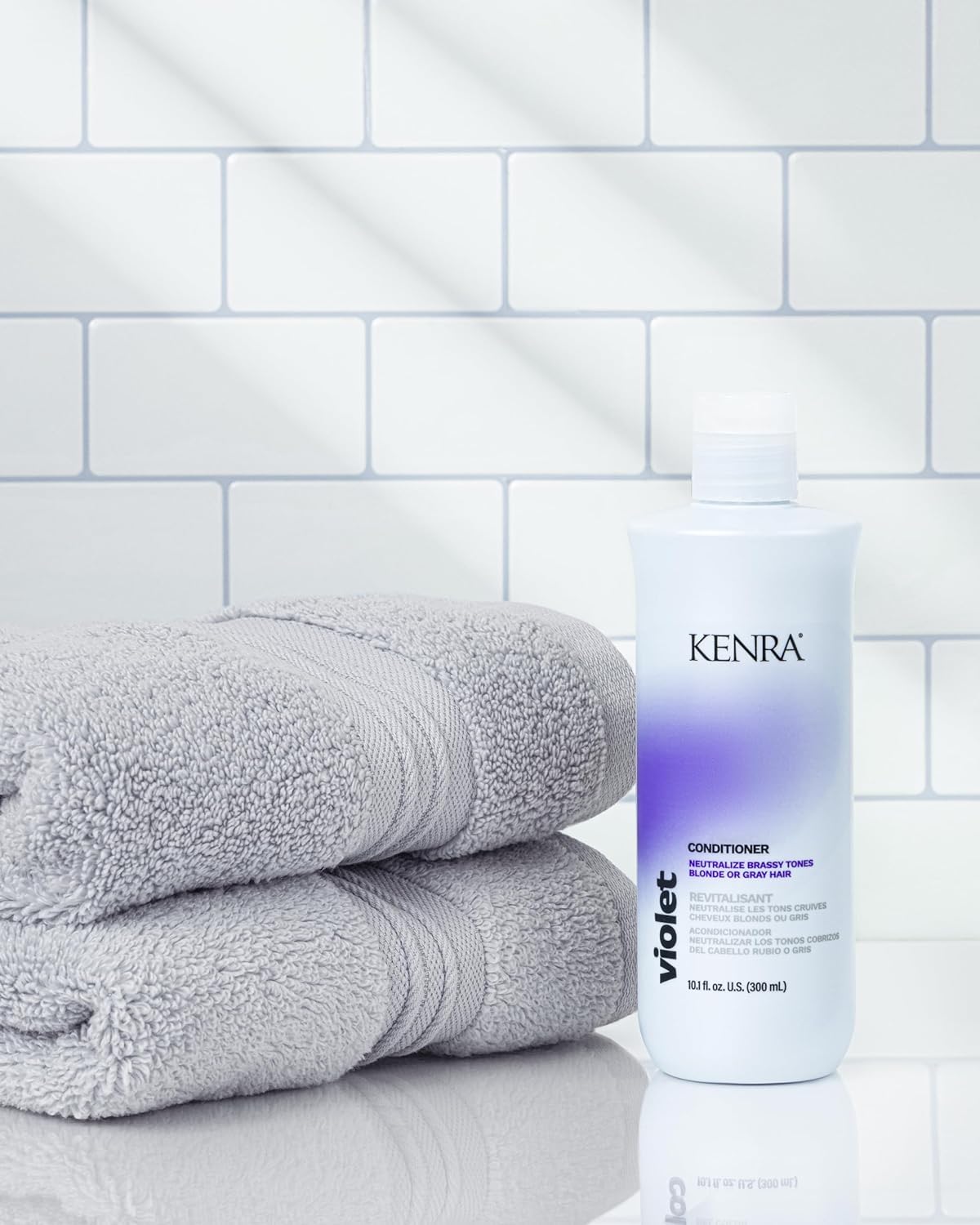 Kenra Violet Conditioner application smoothing damp hair for hydration