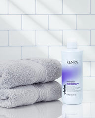 Kenra Violet Conditioner application smoothing damp hair for hydration