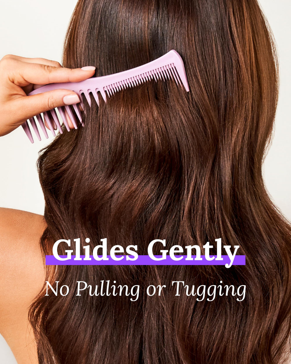 Keranique detangling comb wide-tooth side distributing conditioner evenly from roots to ends.