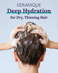 Keranique Keratin Conditioner applied to strands for smoother, more voluminous hair.