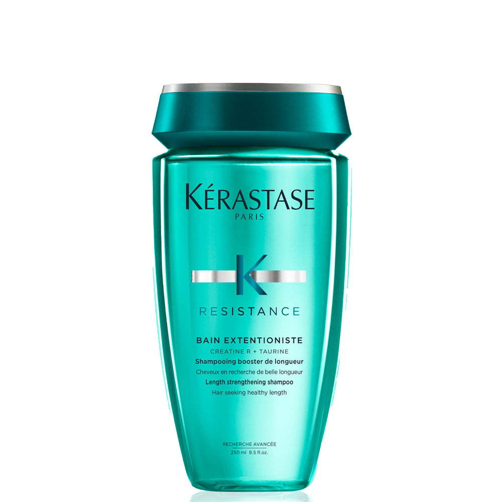 KÉRASTASE Bain Extentioniste shampoo bottle — lightweight fortifying care for damaged hair.
