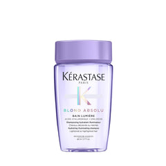 KÉRASTASE Blond Absolu Lumière shampoo bottle shining on lightened hair use case