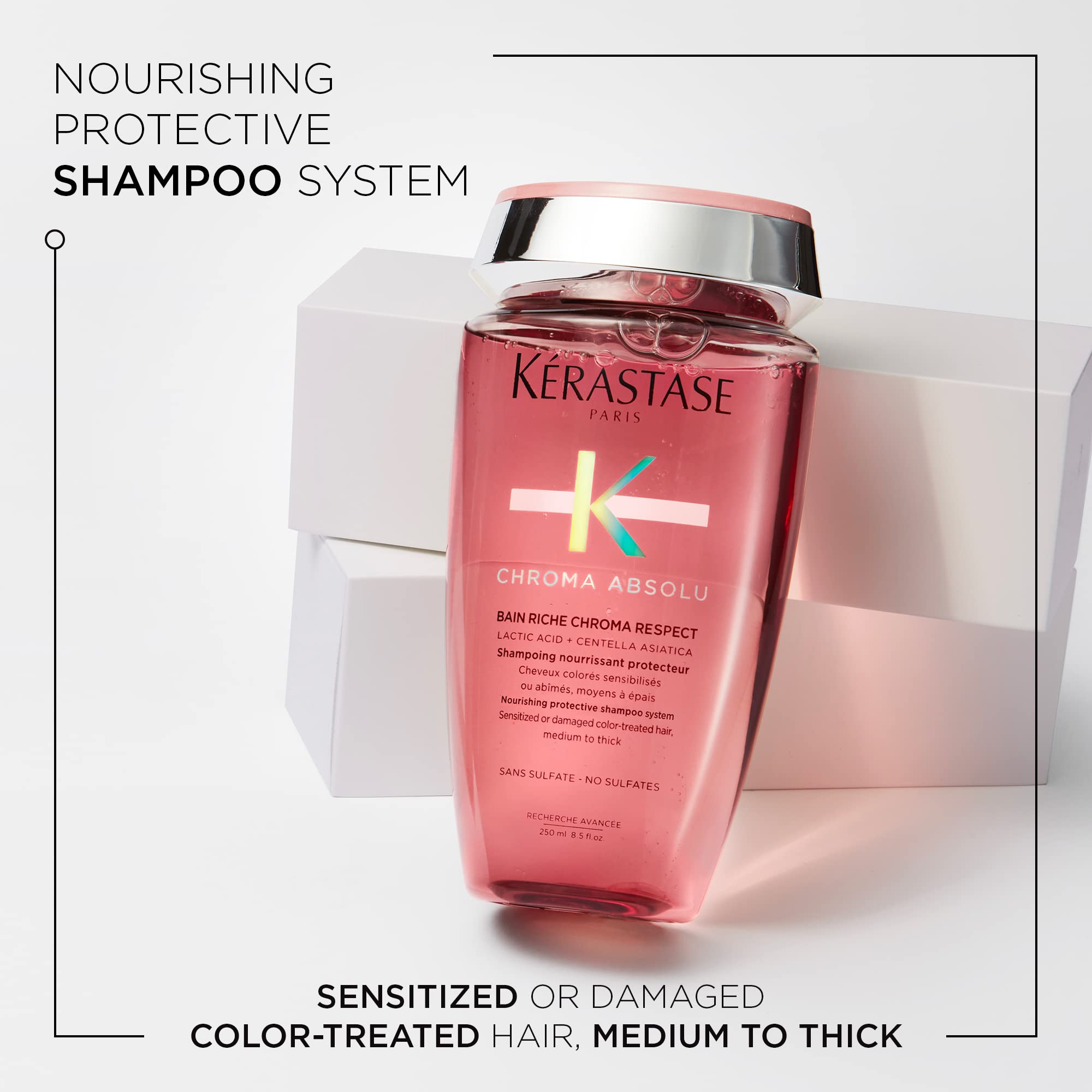 KÉRASTASE Chroma Absolu bottle on shower shelf highlighting sulfate-free cleansing benefits