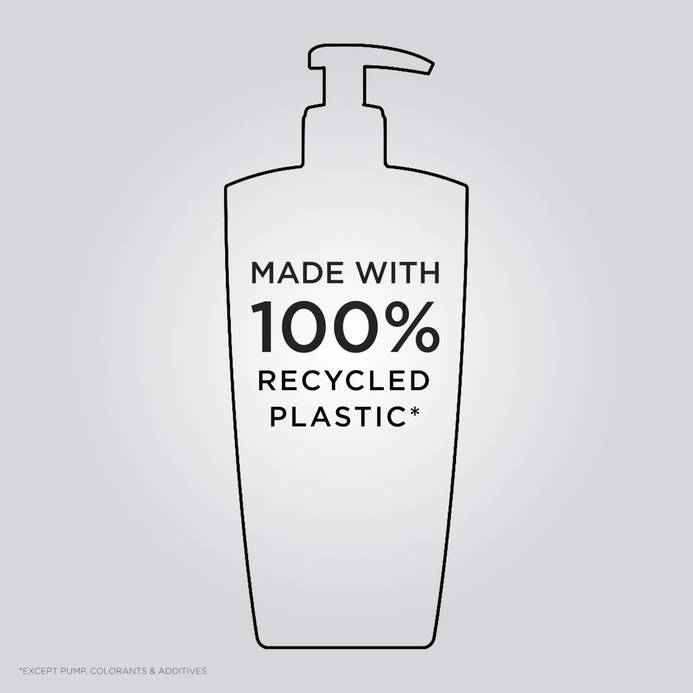 Hair being washed with KÉRASTASE Chroma Respect shows gentle cleansing during wash.
