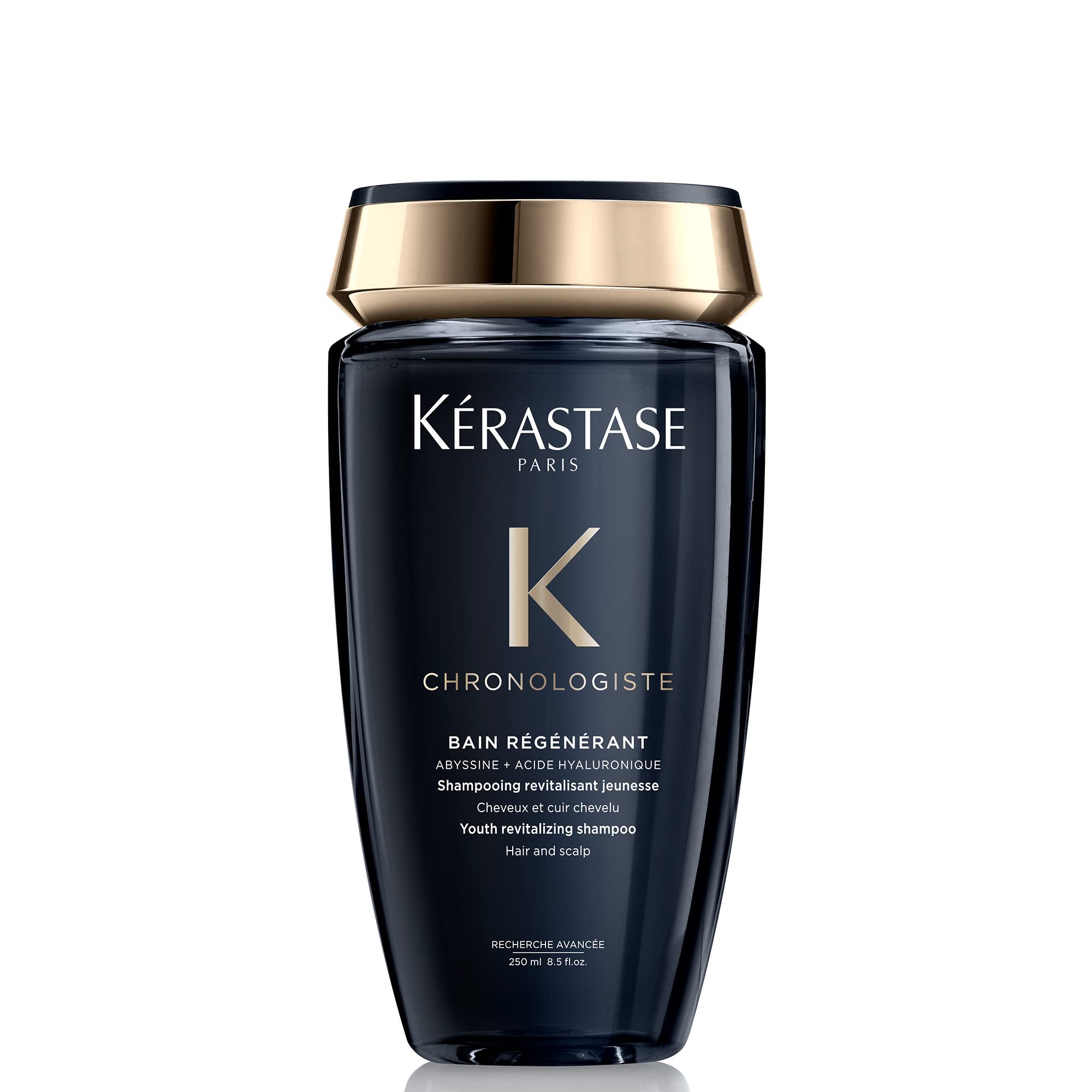 Kerastase Chronologiste Regenerant Shampoo bottle showing hydrating shine benefits.
