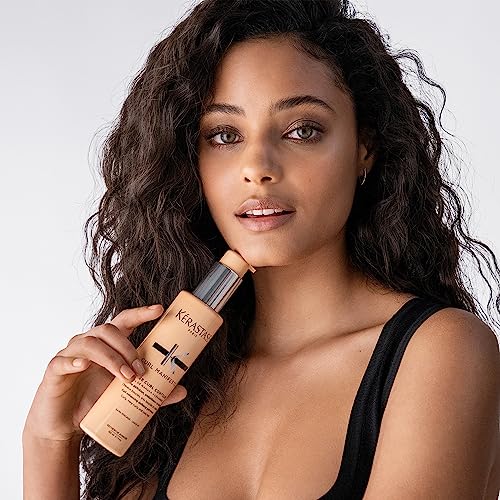 KÉRASTASE Curl Manifesto Gelee serum texture on hand shows lightweight hydration