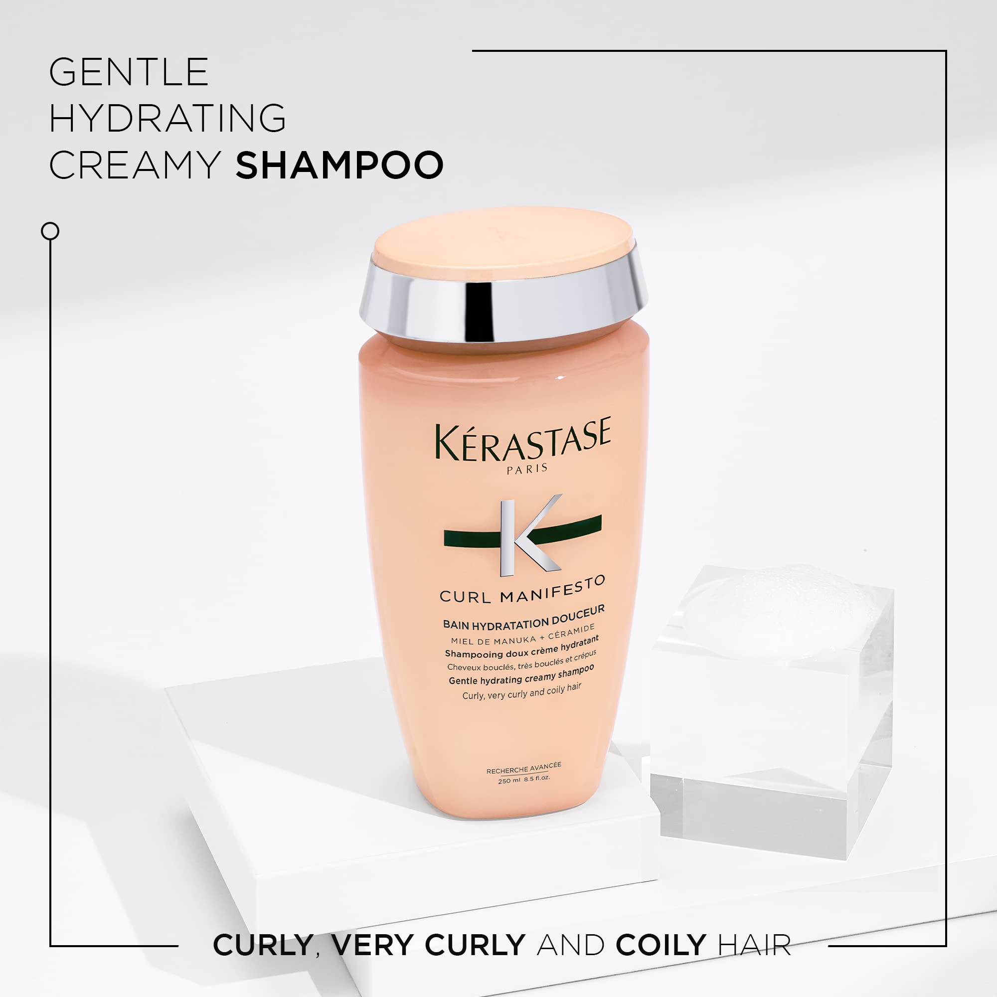 Gently lathered shampoo on curls provides gentle cleansing and shine with KÉRASTASE Curl Manifesto Hydratation Douceur.