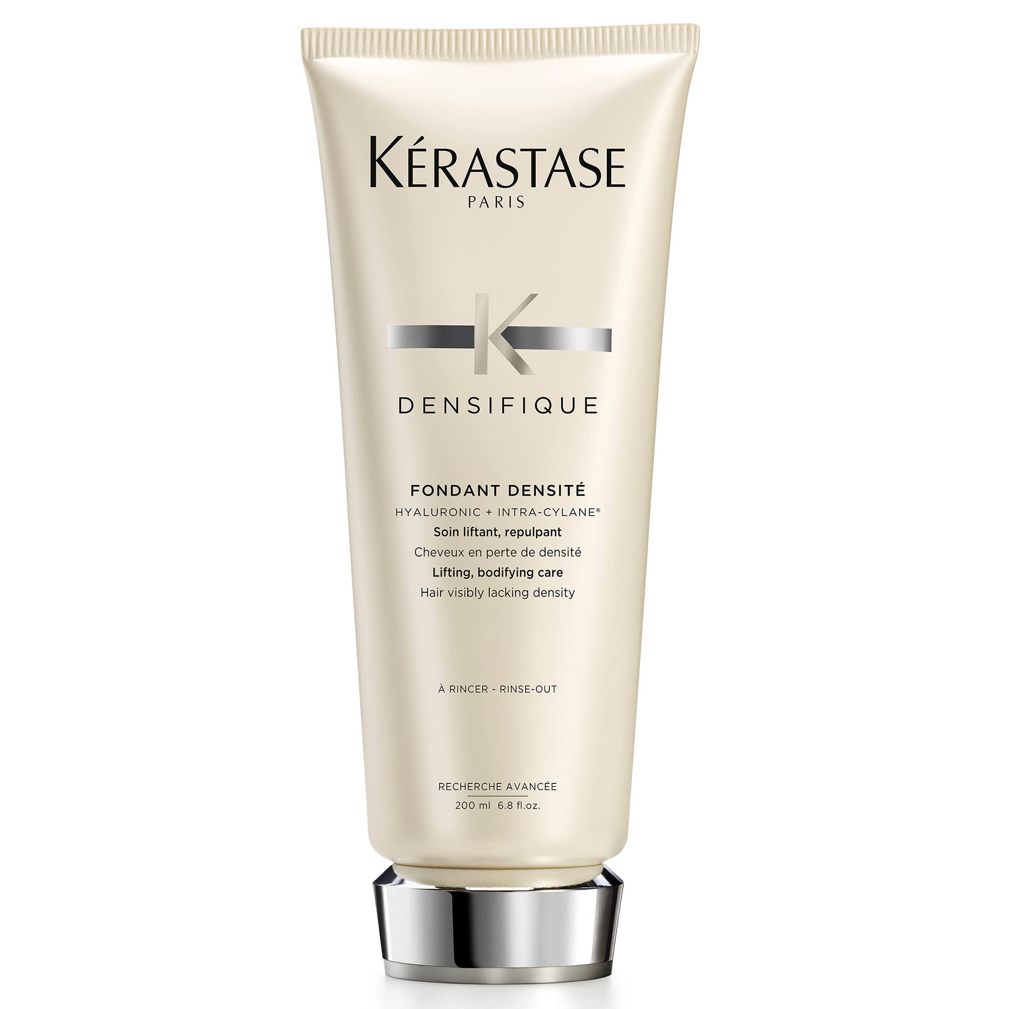 KÉRASTASE Densifique Densité bottle closeup highlights thickening formula for fine hair.