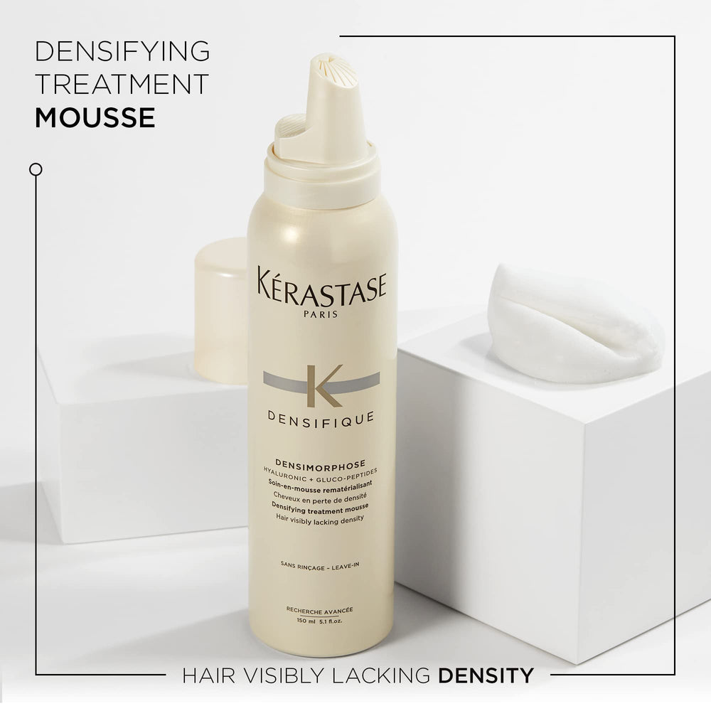 Close-up of Kerastase Densifique Mousse foam shows light texture for lift and shine.