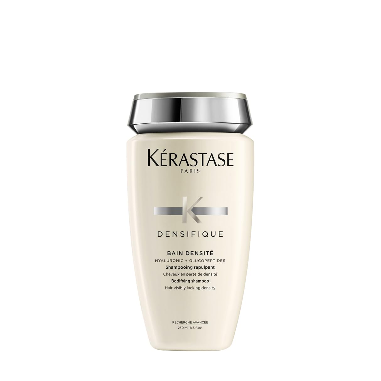 KÉRASTASE Densifique shampoo bottle boosts fullness with gentle cleansing.
