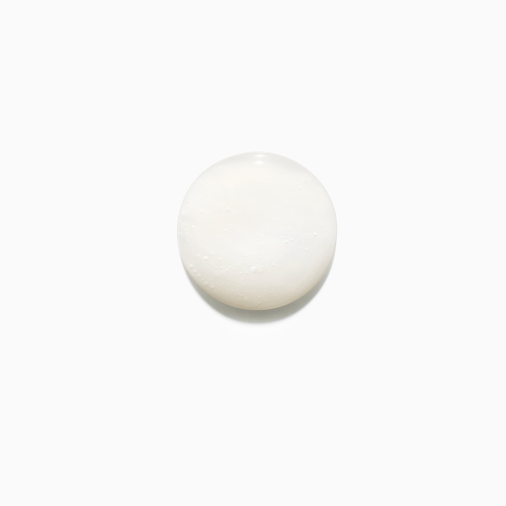 KÉRASTASE Discipline shampoo texture close-up—smoothing formula
